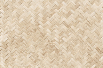 Old bamboo weaving pattern, woven rattan mat texture for background and design art work.