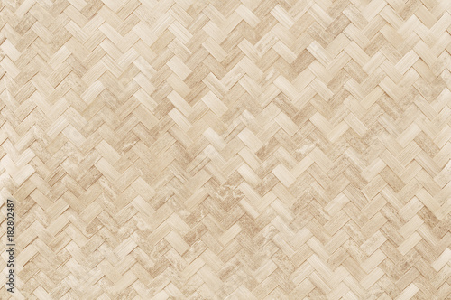 Fototapet Old bamboo weaving pattern, woven rattan mat texture for background and design art work