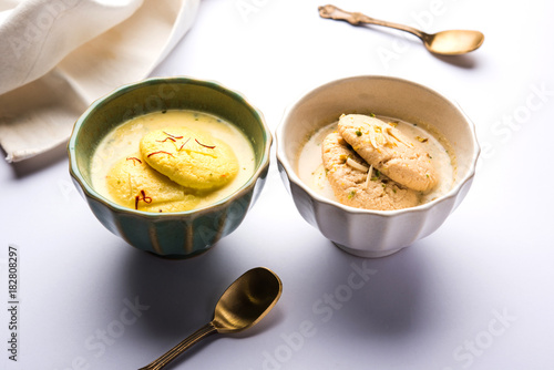 Ras malai or Rasmalai or rossomalai is Indian dessert food made using Jaggery or gur and sugar. It is a rich cheesecake without a crust
 photo