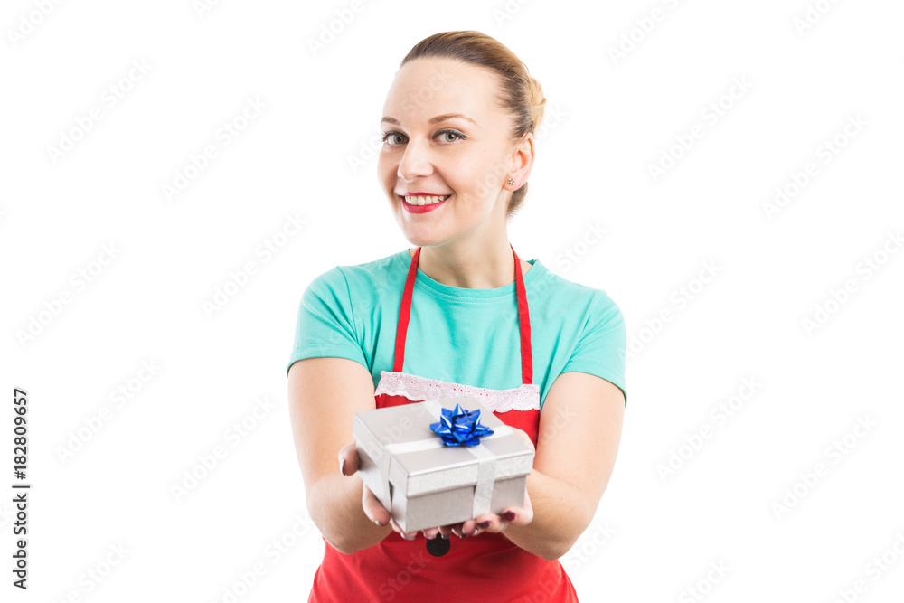 House wife offering wrapped gift box House wife offering wrapped gift box