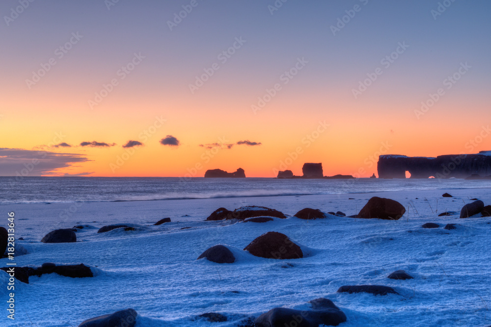 Famous Black beach in Iceland with beautiful sunrise light