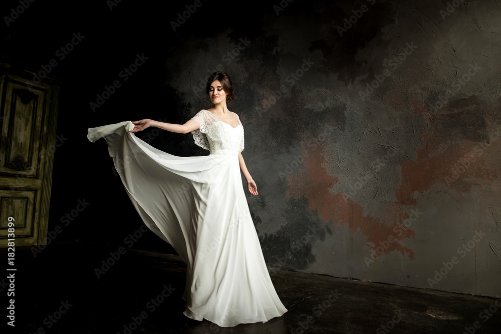 Beautiful Bride Portrait. Beautiful bride whirls her wedding dress. Beautiful Bride Portrait. Beautiful bride whirls her wedding dress.