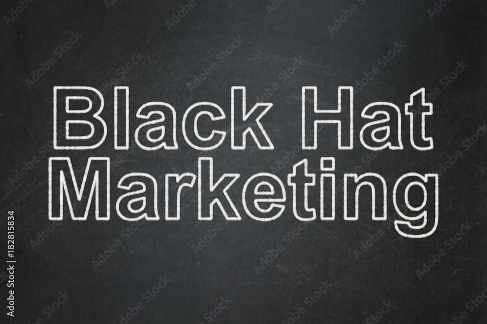 Business concept: text Black Hat Marketing on Black chalkboard background Business concept: text Black Hat Marketing on Black chalkboard background
