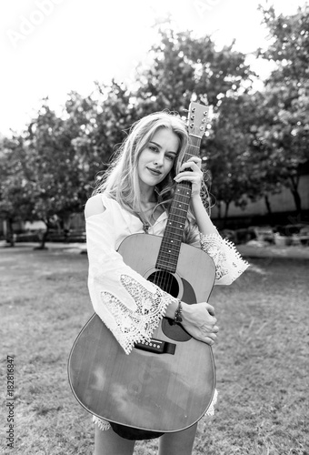 Beautiful singer songwriter with her guitar