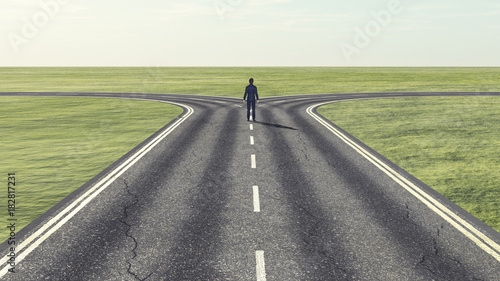 Businessman in front of a bifurcation