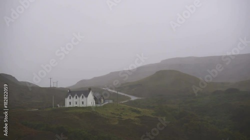 White House in the Isle of Skye in Scotland under the rain