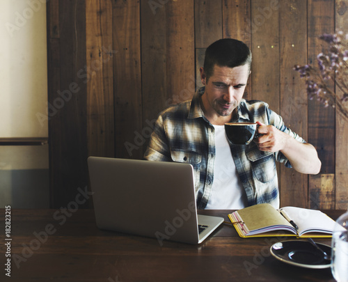A man having a coffee photo
