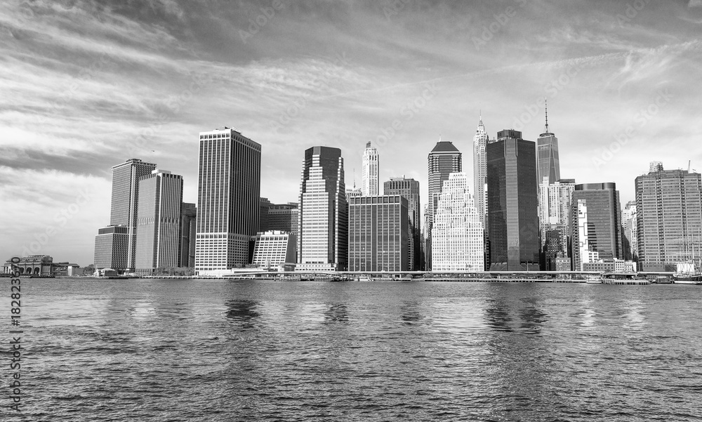 Downtown Manhattan and East River reflections