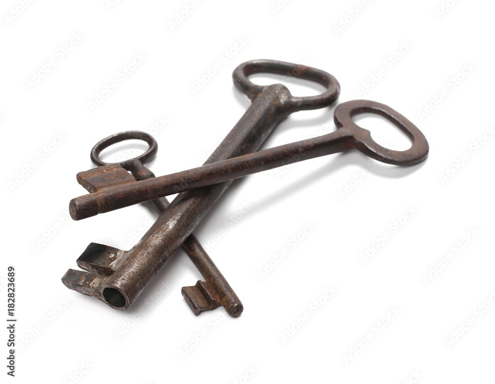 Old keys isolated on white background