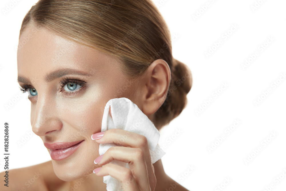 Face Care. Smiling Female Removing Makeup, Cleaning Facial Skin Face Care. Smiling Female Removing Makeup, Cleaning Facial Skin