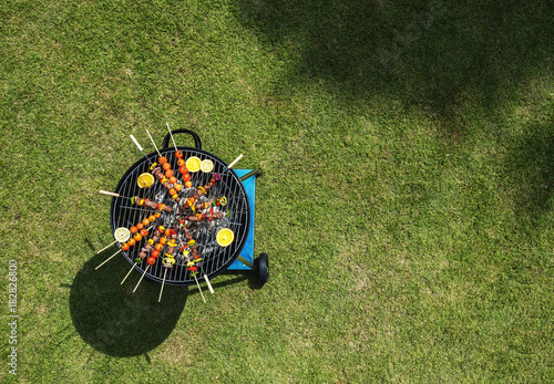 Aerial view of barbecues steaks on the charcoals grill