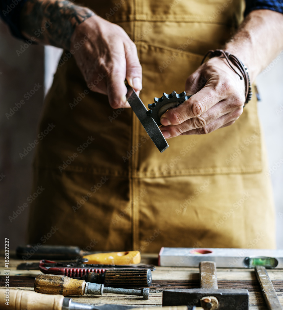 Closeup of carpenter working with his tools