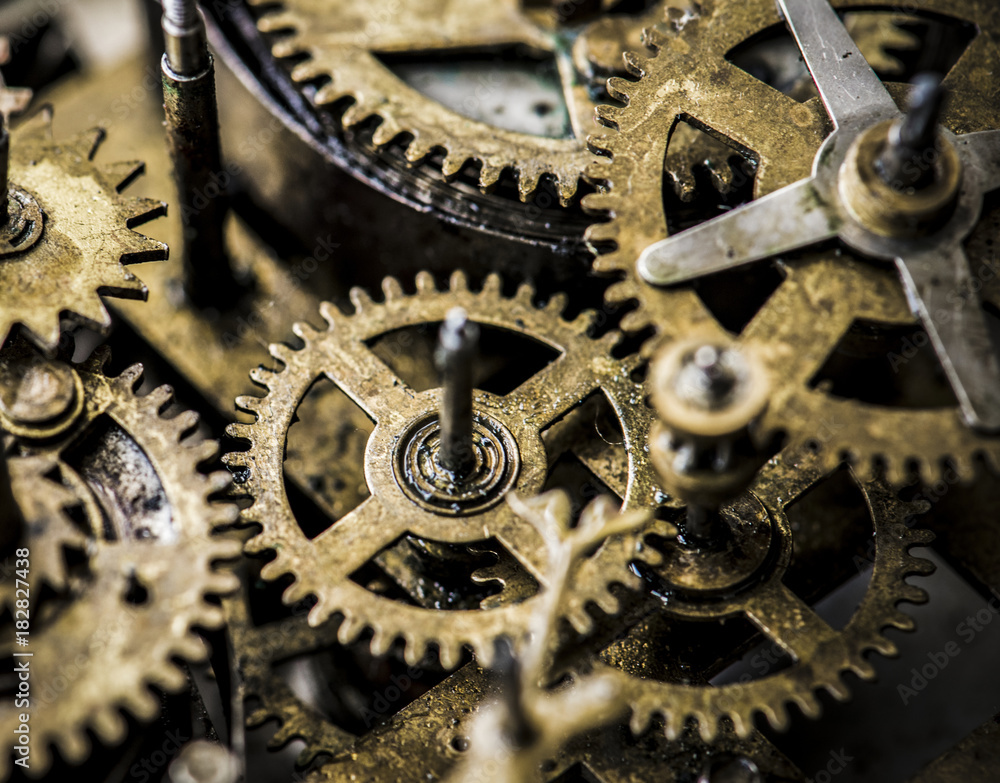 Closeup of gears and cogs clockwork macro shot Closeup of gears and cogs clockwork macro shot