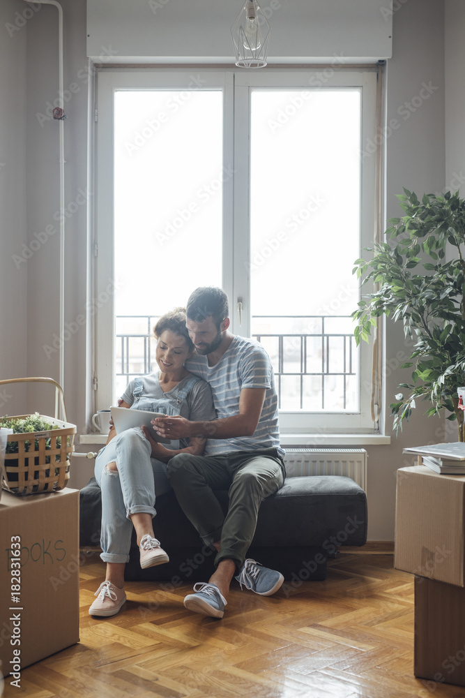 Couple Enjoying Their New Home Couple Enjoying Their New Home