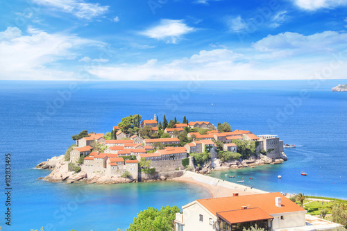 Beautiful view of the island-resort of St. Stefan (Sveti Stefan) on the Budva Riviera, Budva, Montenegro on a sunny day
