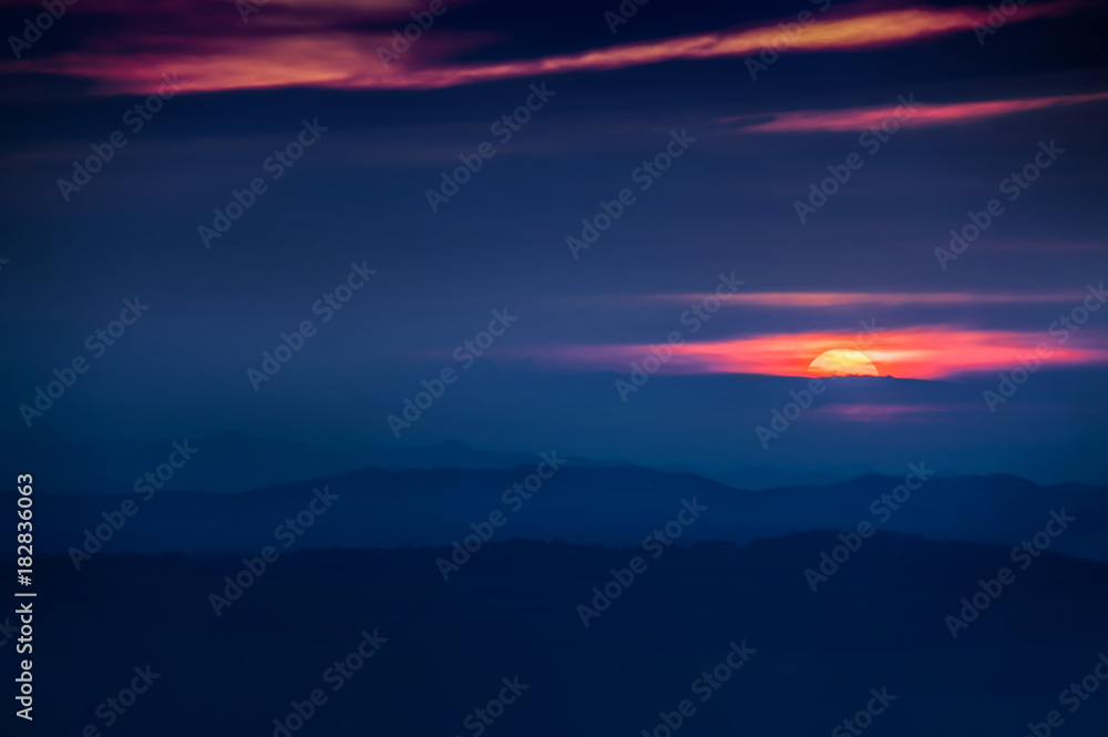 Fototapeta premium view of lonely sunset in the mountain on winter season