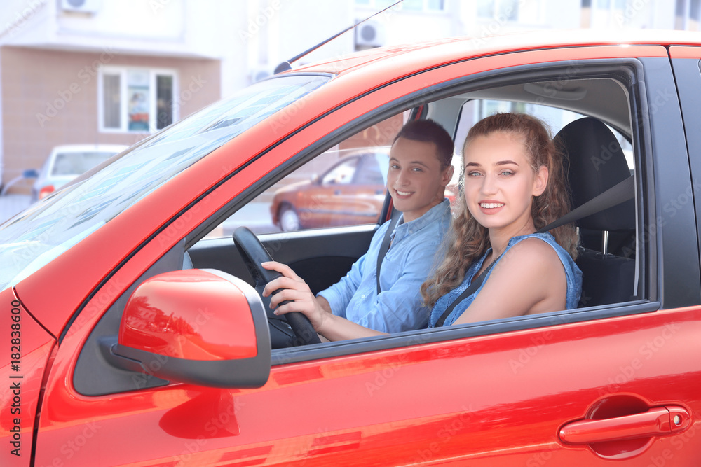 Young couple travelling by car Young couple travelling by car