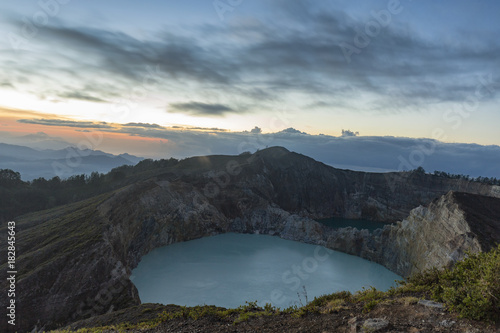 Dawn breaks over Danau Kootainuamuri and Danau Alapolo, two of three crater lakes at the Kelimutu National Park in Indonesia.