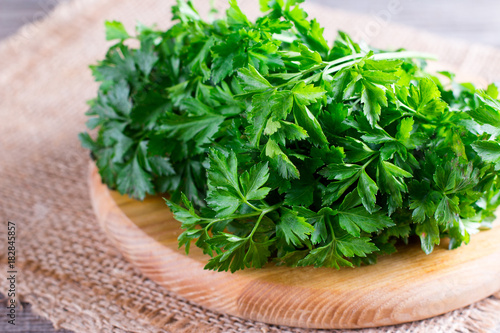 Green parsley on old plank