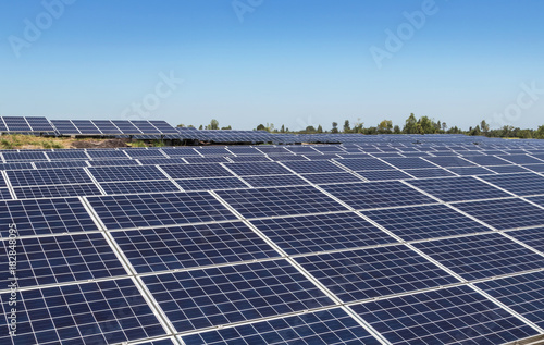 rows array of polycrystalline silicon solar cells in solar power plant turn up skyward absorb the sunlight from the sun alternative renewable energy from the sun 