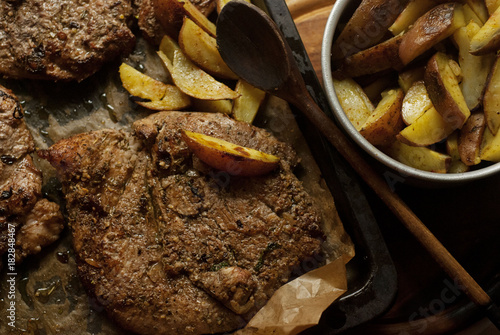 Meat steak with fry potates. Top view. photo