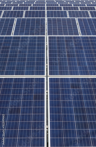 Close up rows array of polycrystalline silicon solar cells in solar power plant alternative renewable energy from the sun 