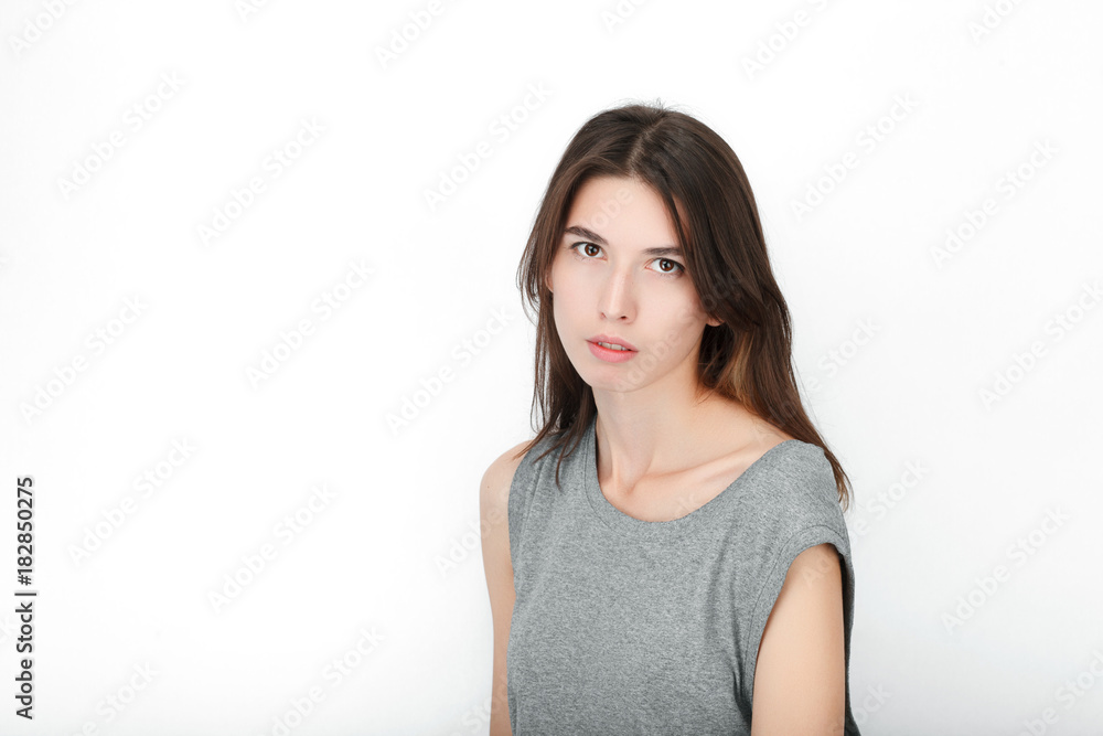 Excited happy looking woman. Closeup of happy mixed race asian caucasian female model isolated on white background. Excited happy looking woman. Closeup of happy mixed race asian caucasian female model isolated on white background.