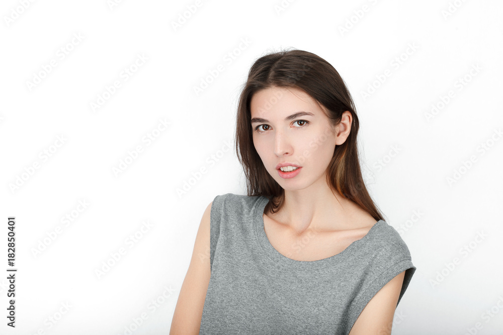 Excited happy looking woman. Closeup of happy mixed race asian caucasian female model isolated on white background. Excited happy looking woman. Closeup of happy mixed race asian caucasian female model isolated on white background.