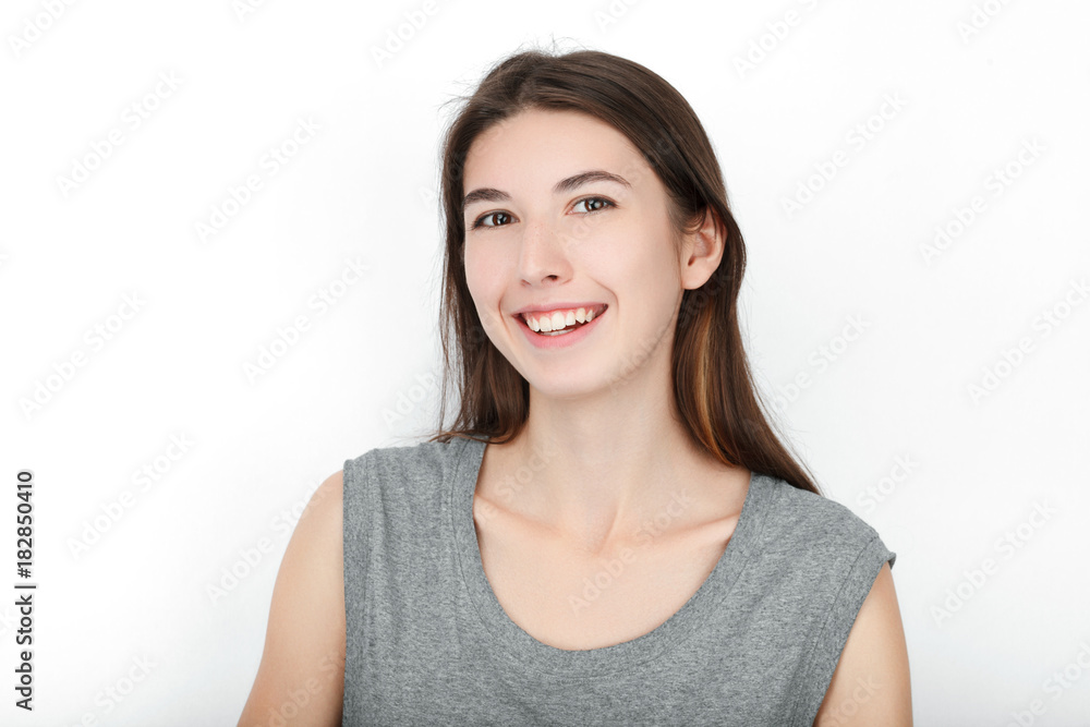 Excited happy looking woman. Closeup of happy mixed race asian caucasian female model isolated on white background. Excited happy looking woman. Closeup of happy mixed race asian caucasian female model isolated on white background.