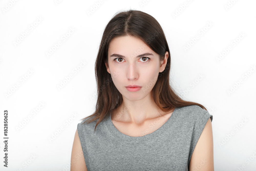 Excited happy looking woman. Closeup of happy mixed race asian caucasian female model isolated on white background. Excited happy looking woman. Closeup of happy mixed race asian caucasian female model isolated on white background.