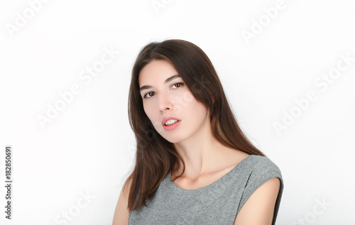 Excited happy looking woman. Closeup of happy mixed race asian caucasian female model isolated on white background.