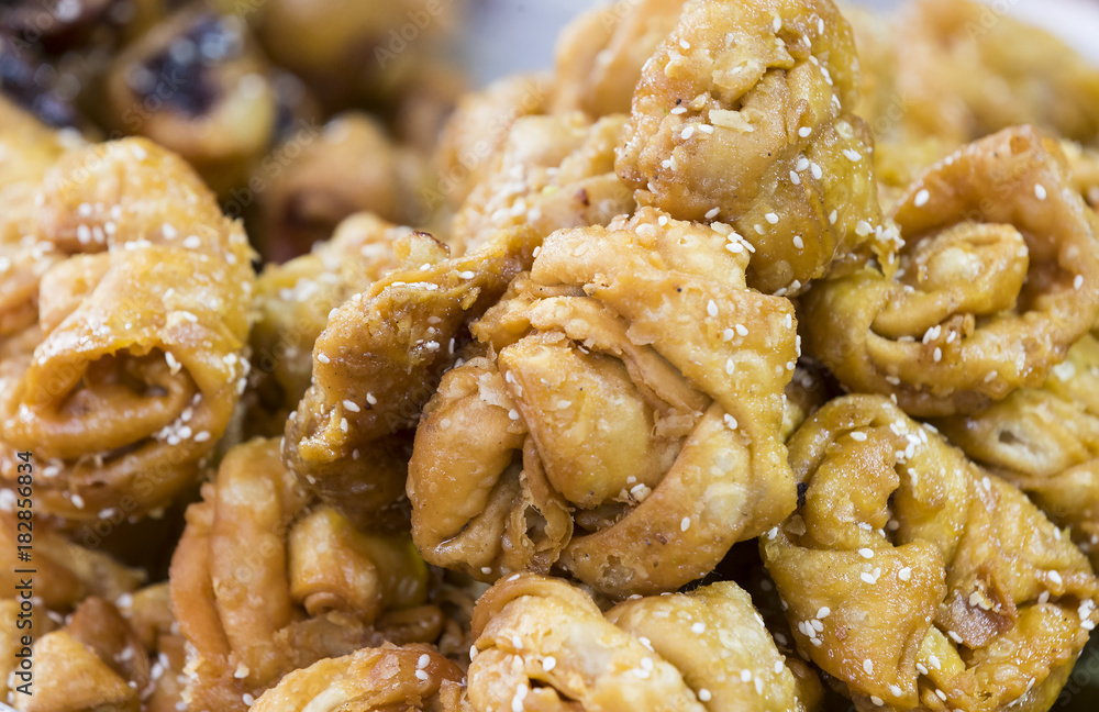 Oriental sweets baked on the market close-up photo Oriental sweets baked on the market close-up photo