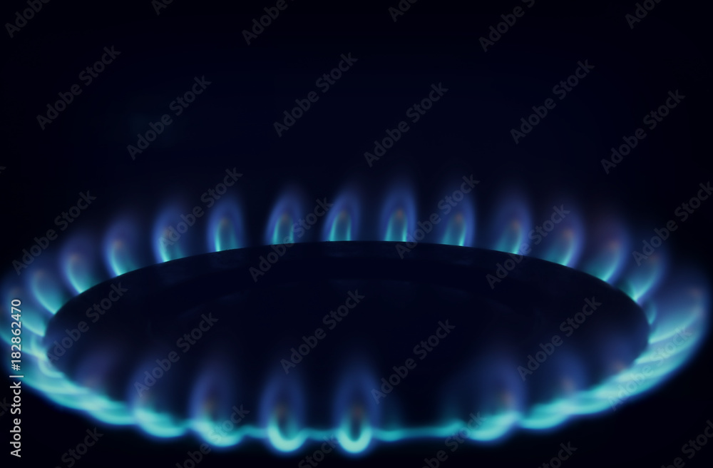 Gas burning in the burner over black background. Gas burning in the burner over black background.