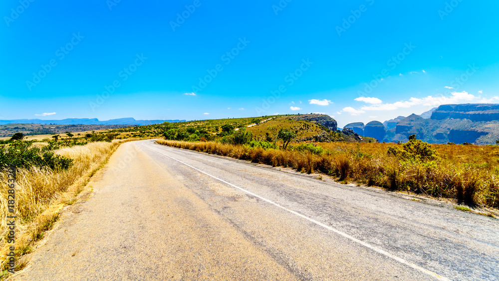 The road on the Highveld plateau that is going to the viewpoint of the Three Rondavels at the Blyde River Canyon along the Panorama Route in Mpumalanga Province of South Africa