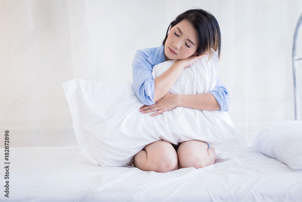 beautiful asian girl casual costume ralax on white bed next to window curtian with sunlight beauty skin concept beautiful asian girl casual costume ralax on white bed next to window curtian with sunlight beauty skin concept