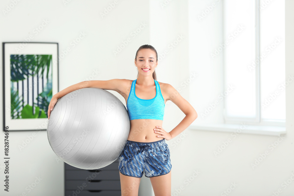 Sporty young woman with fitball at home Sporty young woman with fitball at home
