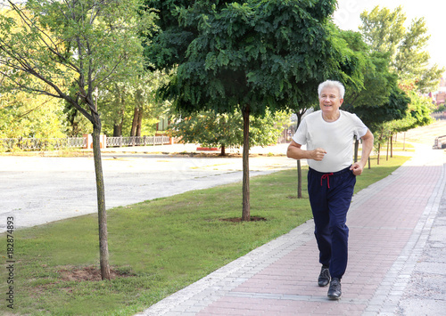 Mature man training outdoors