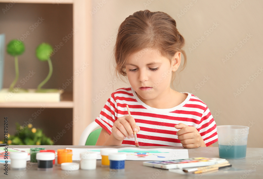 Little girl painting at home Little girl painting at home