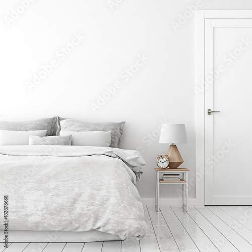 Home interior wall mock up with unmade bed, cushions, door, lamp and alarm clock in white bedroom. 3D rendering.