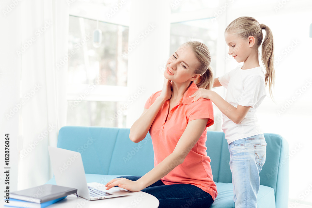 Mother is passionate about working on a laptop. Daughters do not have enough attention from mother. Mother is passionate about working on a laptop. Daughters do not have enough attention from mother.