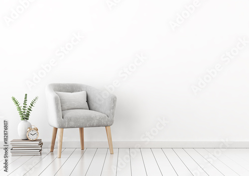 Livingroom interior wall mock up with gray velvet armchair  cushion  books and plant in vase on empty white background. 3D rendering.