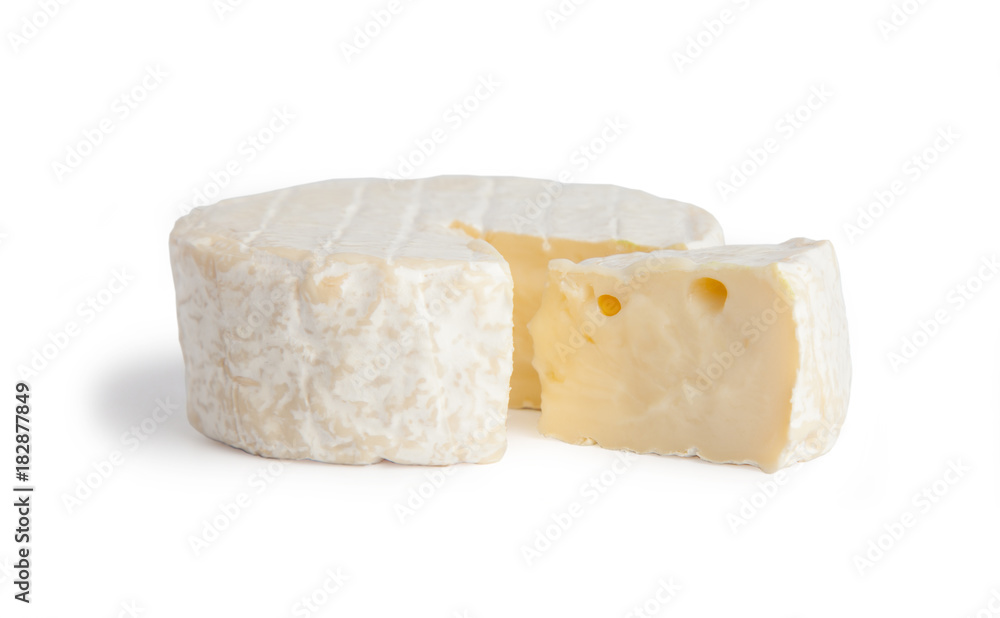 Brie type of cheese. Camembert cheese. Fresh Brie cheese and a slice. Italian, French cheese. Isolated on a white background.