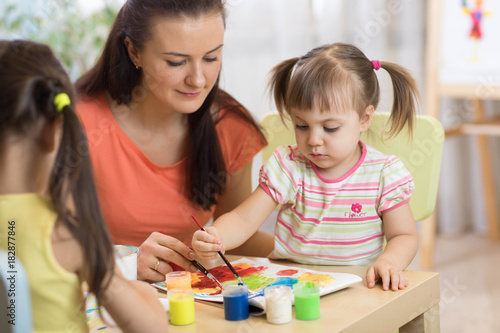 Children painting in presch...