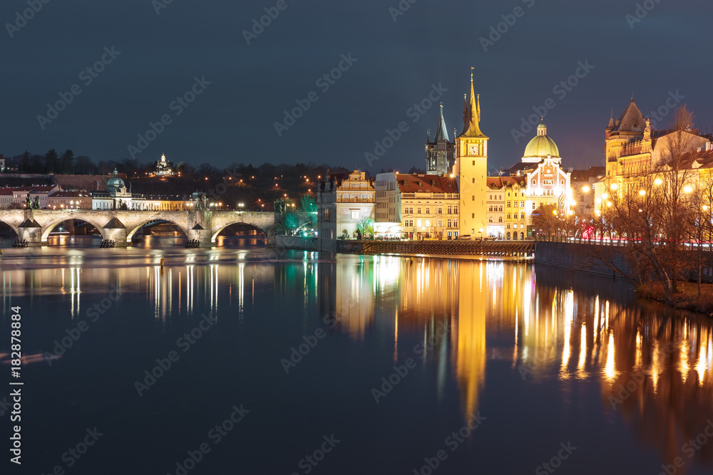Picturesque night view of the Vltava River, Charles Bridge and Old Town in Prague, Czech Republic