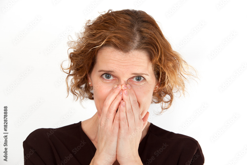Young beautiful woman in despair covered her face Young beautiful woman in despair covered her face