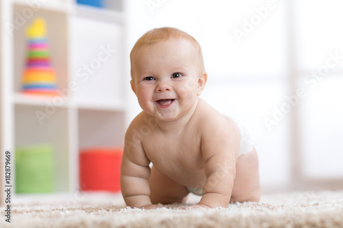 crawling baby boy at home o...