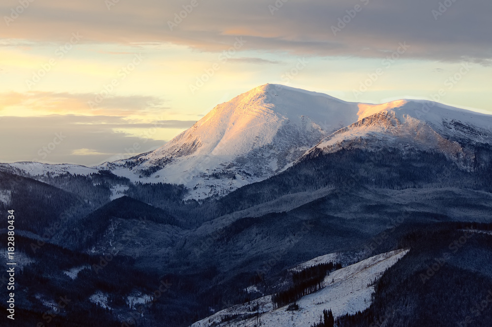 Mountain landscape with soft colors at sunrise. Mount Petros, Carpathians, Ukraine