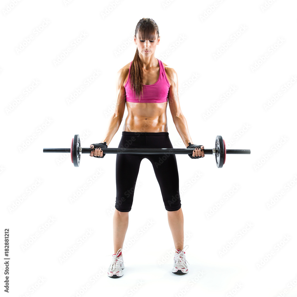 Fit and sporty young woman doing weights over white background. Fit and sporty young woman doing weights over white background.