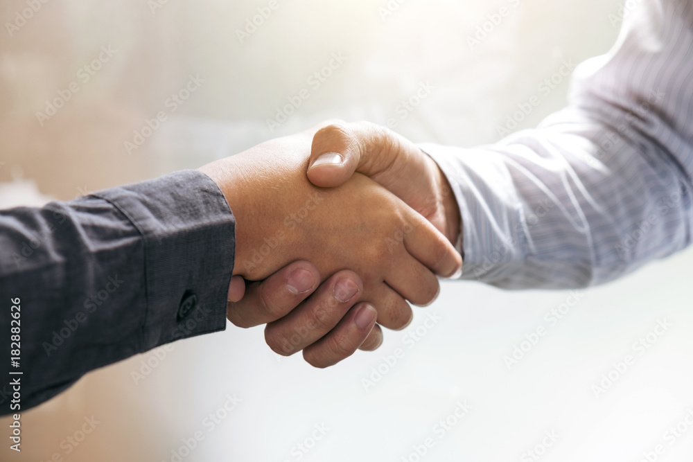 Meeting and greeting concept, Two confident Business handshake and business people after discussing good deal of Trading contract and new projects for both companies, success, partnership, co worker