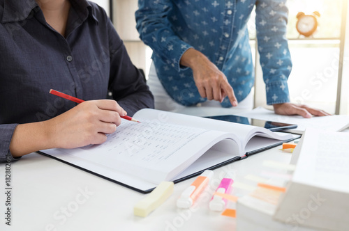 Images of Disappointed, Young students campus or classmates helps friend catching up workbook and learning tutoring in classroom, teaching, learning, People, technology, Education school concept